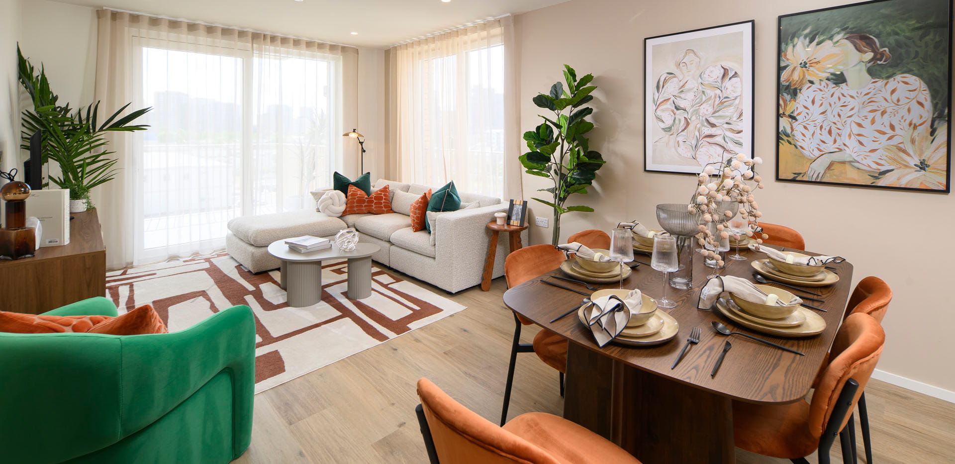 Decorated, wooden dining table and modern designed living space.