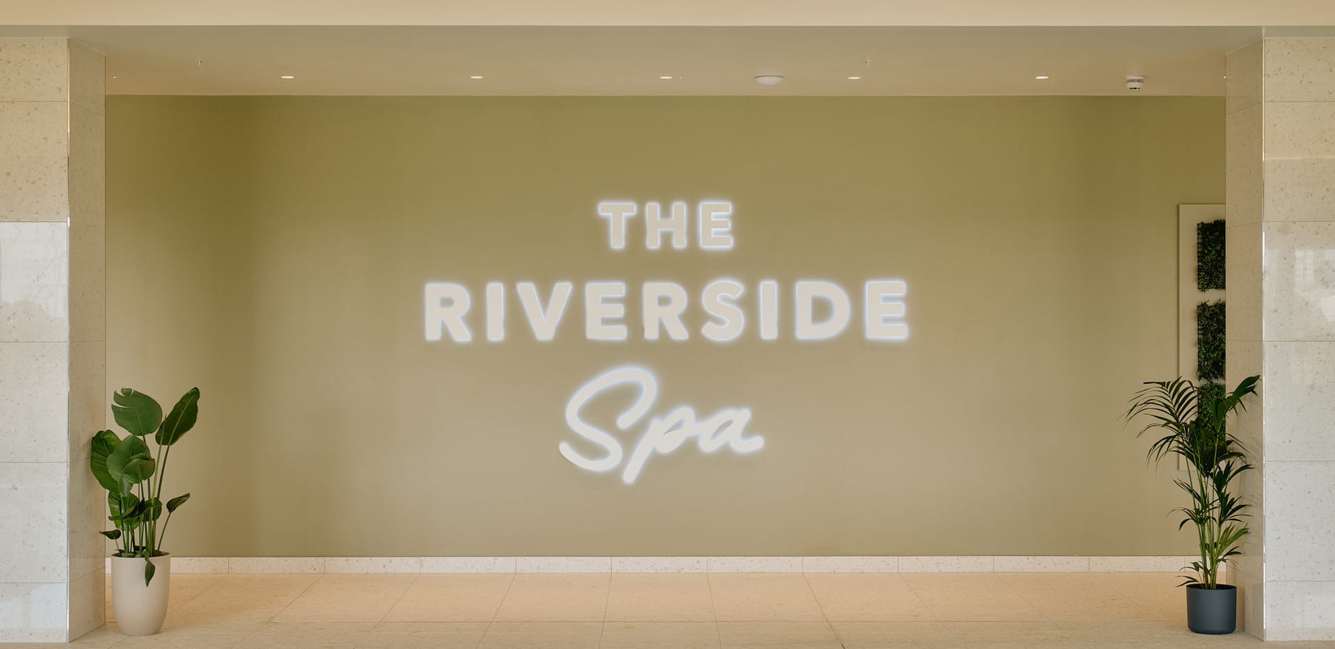A sign that reads Riverside Spa.
