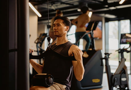 An image of a person working at at the Gym in The Riverside Club