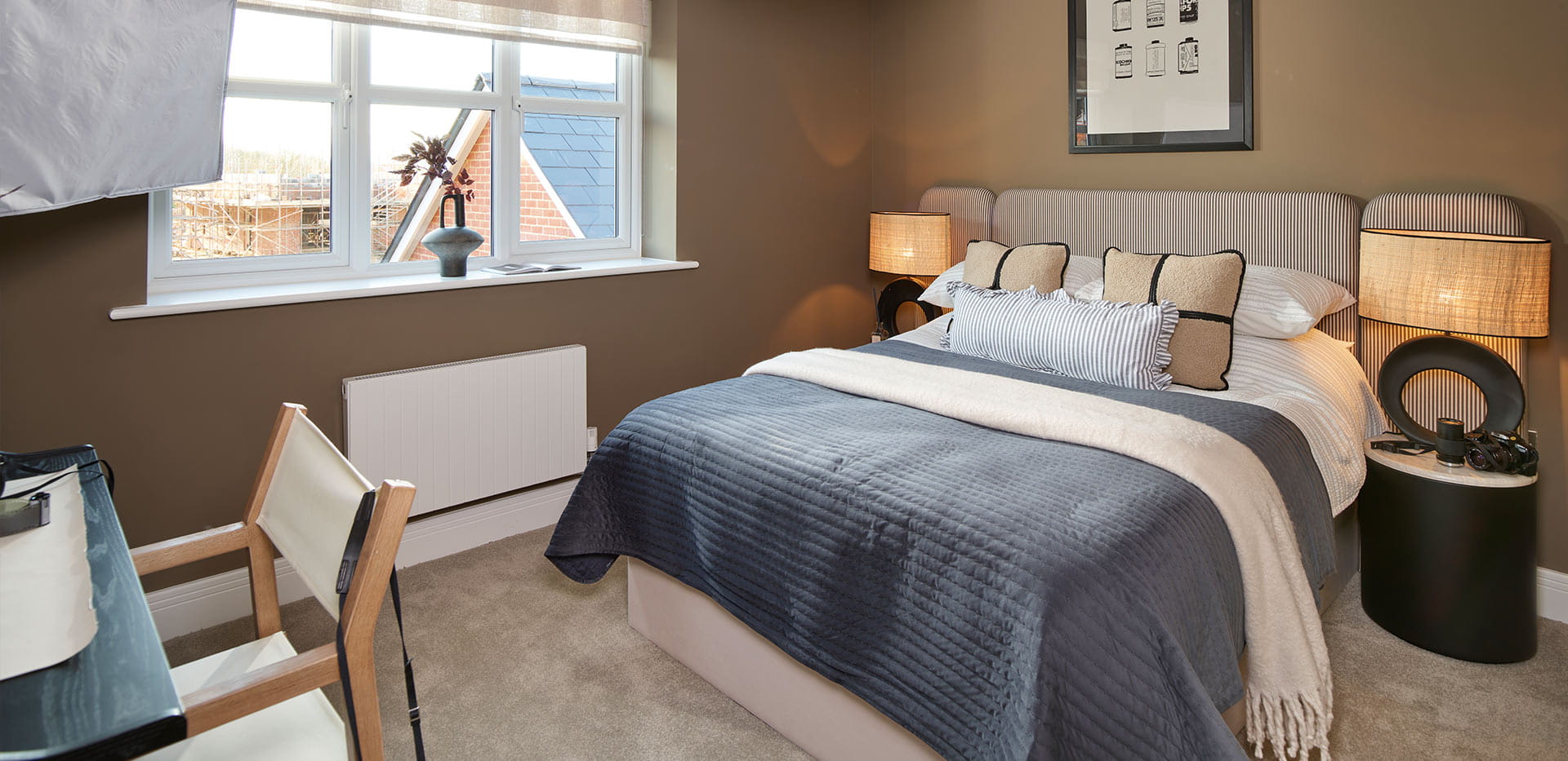 An interior Bedroom Image with Blue covers