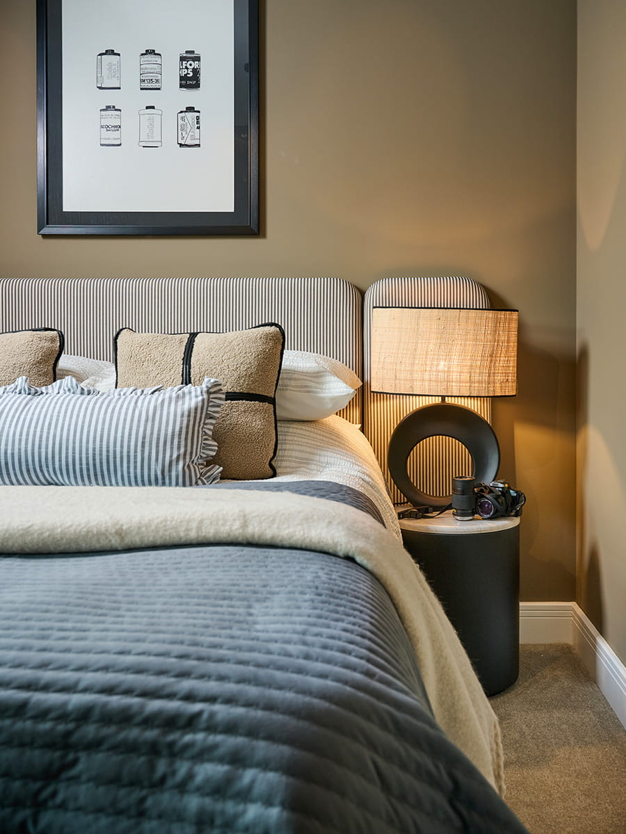 An interior photo close up of a Bed with blue covers at The Cornflower