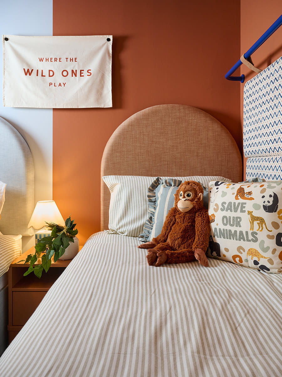 An interior Childrens Bedroom with a close up of the Bed