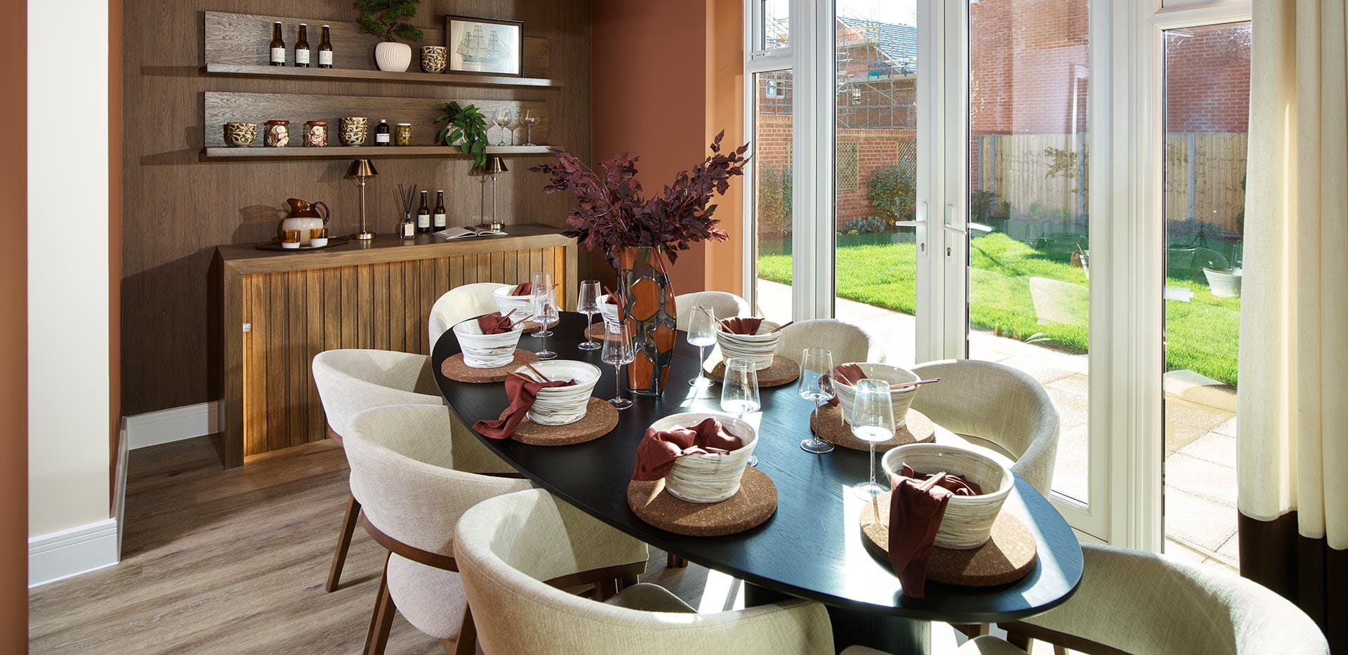 An interior Dining Room image with views into the Garden