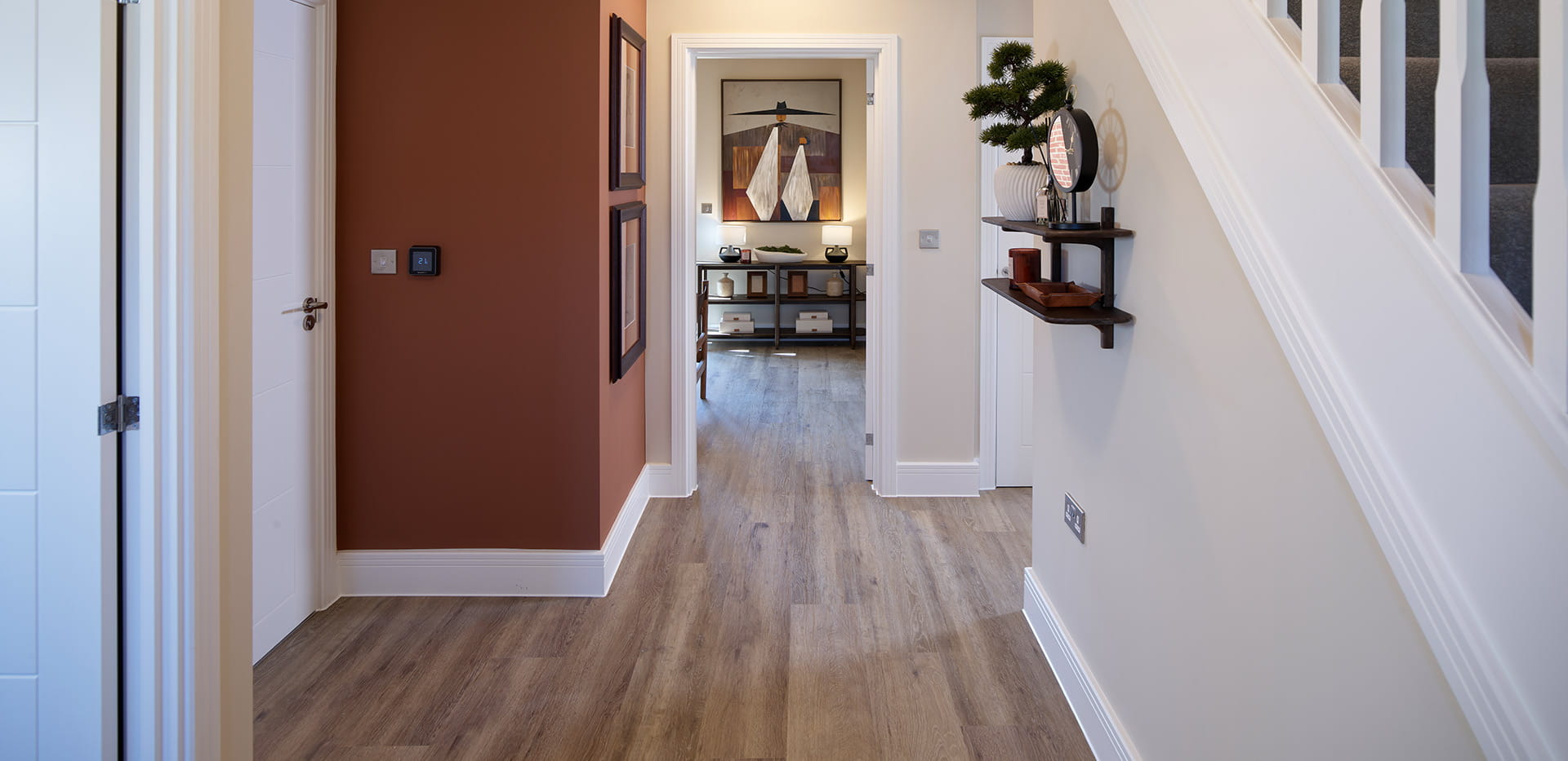An interior Hallway image with views into the Living Area