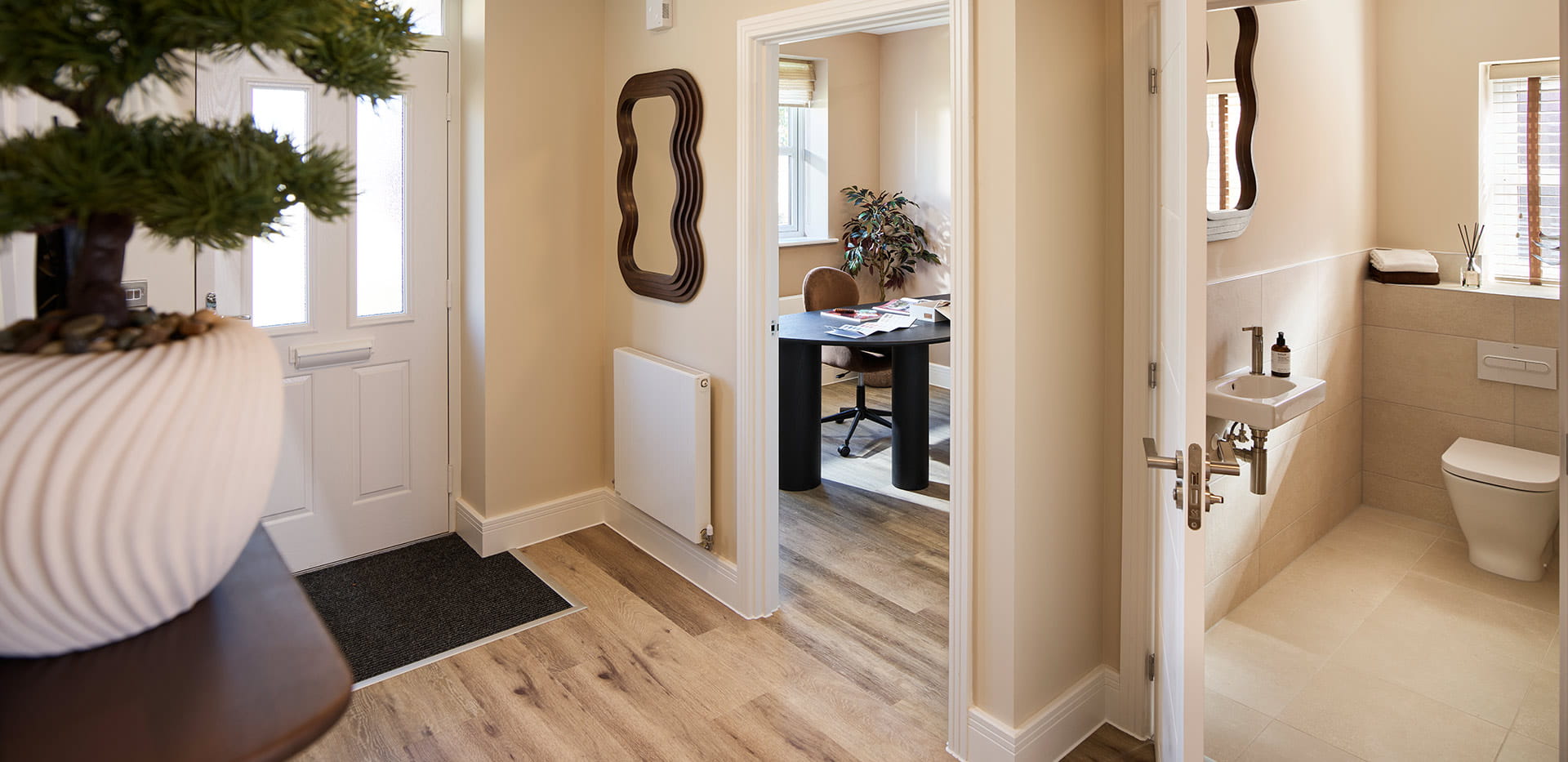 An interior Entrance image with view of the living and WC