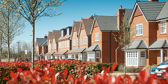 A street scene image of Highcroft 1-3 bedroom houses