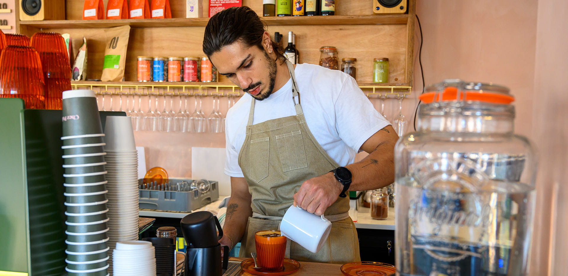 Barista preparing coffee at Chez Polie