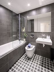 Dareham Court bathroom with black and white contrasting theme