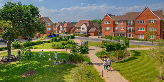 An exterior street scene image of Highwood Village