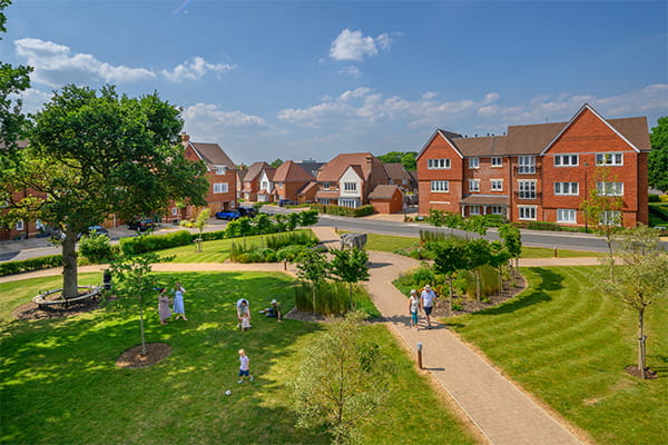 Highwood Village Mobile Header Image Showing Exterior of Detached Homes