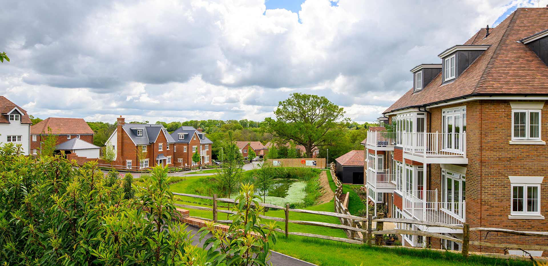Hollyfields exterior photo of houses and apartments