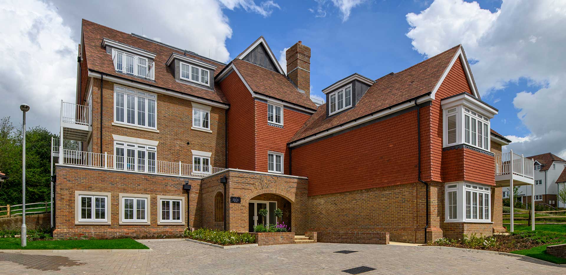 Hollyfields exterior photo of apartments from a front view