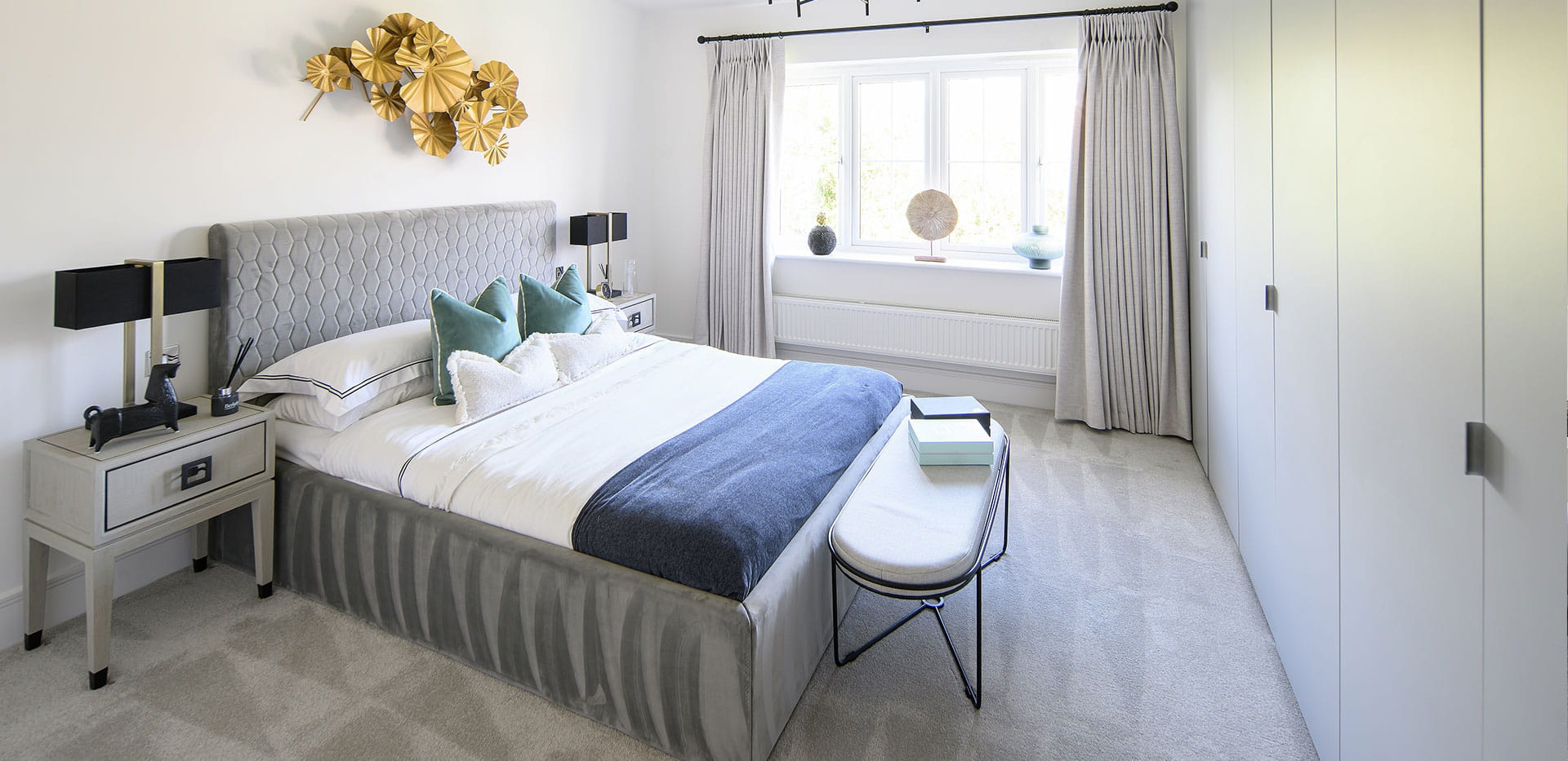 Hollyfields two bedroom apartment double bedroom with a neutral design