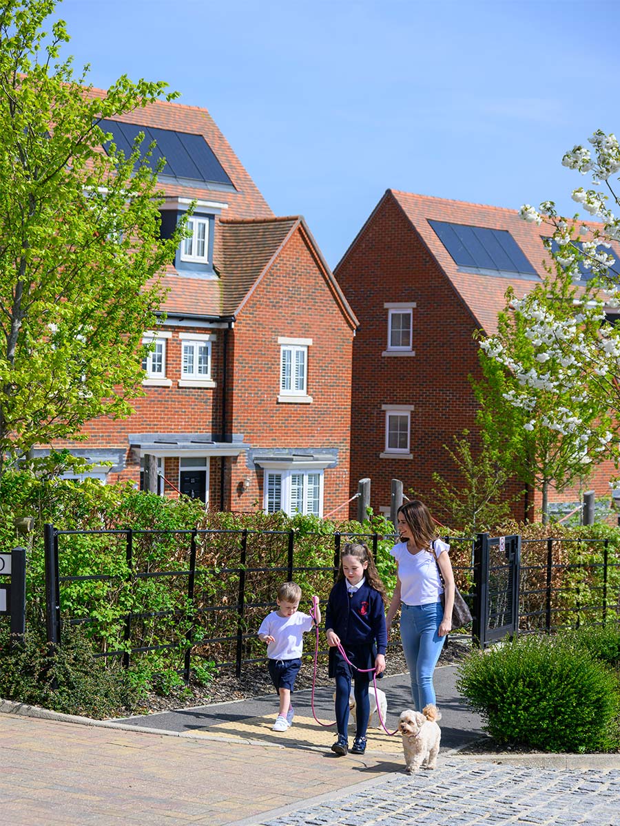 Family on a dog walk in Hollyfields