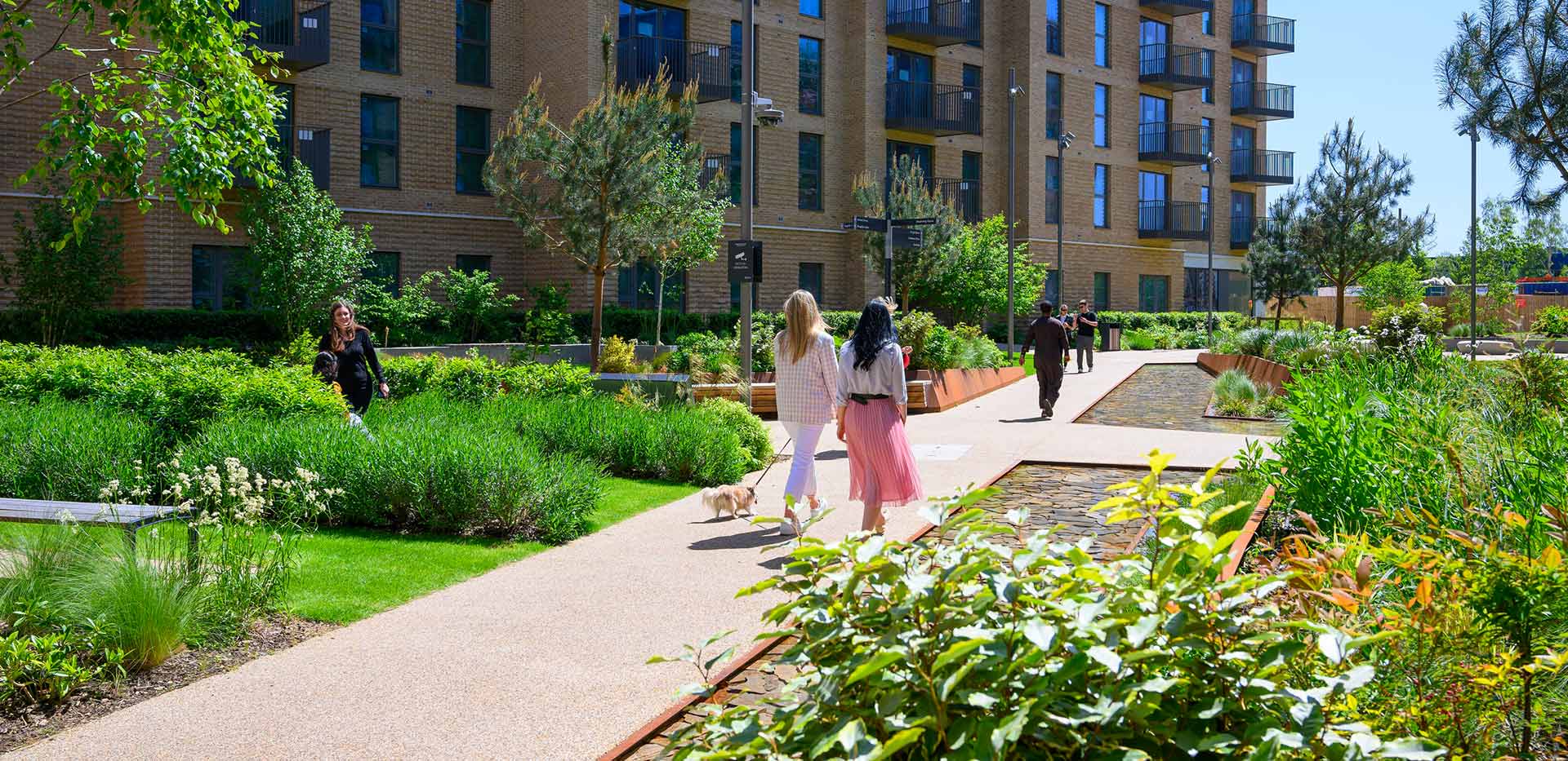 Horlicks Quarter residents walking through the development