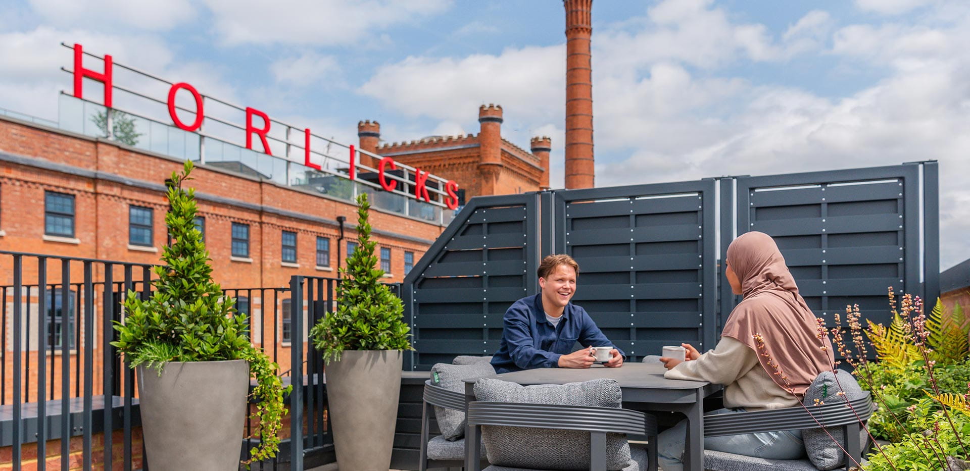Horlicks Quarter residents enjoying the rooftop seating