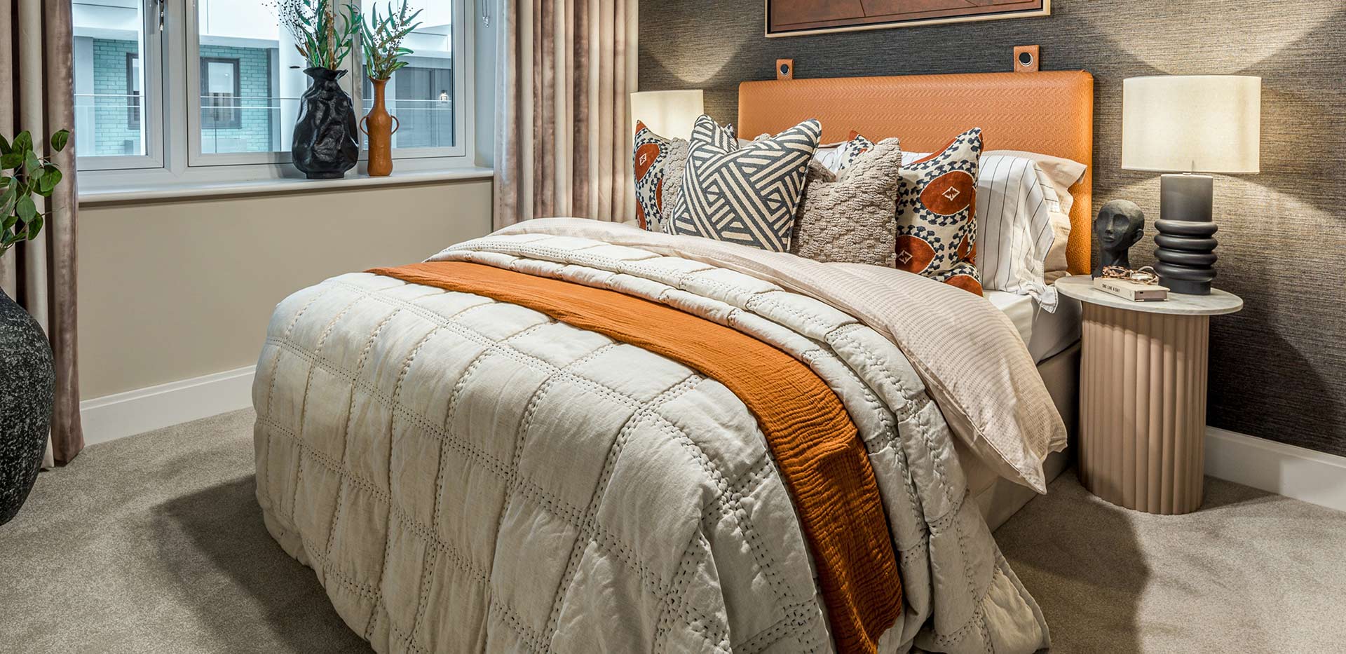 Horlicks Quarter home, spacious bedroom with cosy lighting