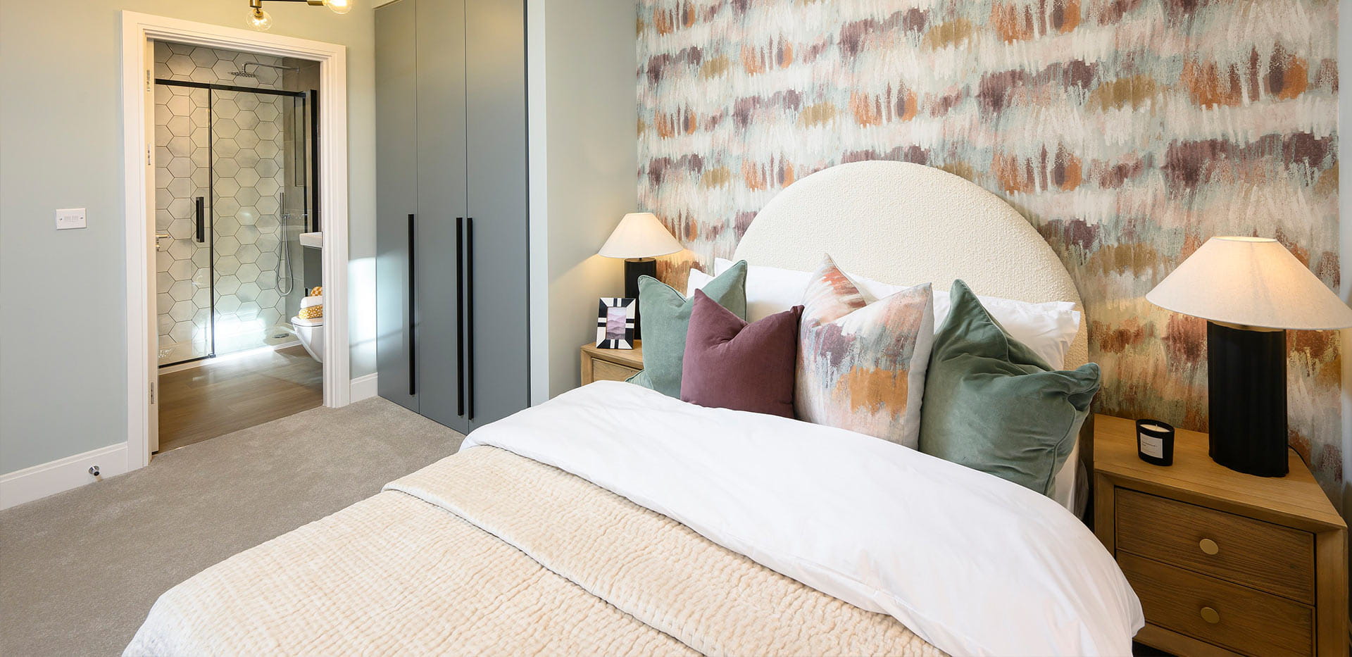 An interior Bedroom image with feature wall at the Urban Houses at Horlicks Quarter