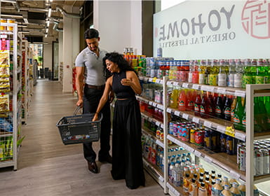 Two people shopping in an Asian supermarket