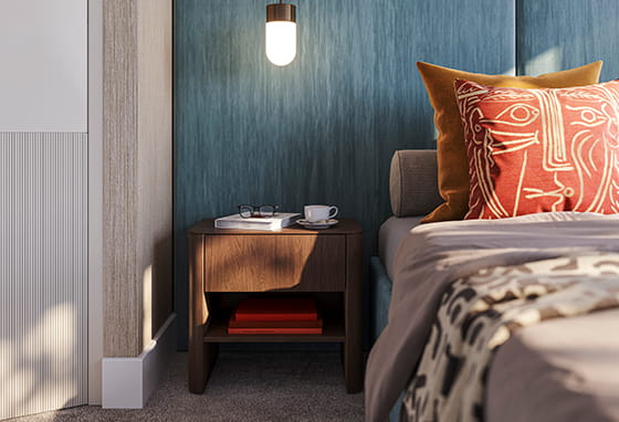 An interior CGI close up of bed and side table at Lily Residences