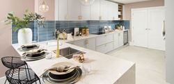 Knights Quarter townhouse L-shaped kitchen design with a neutral finish