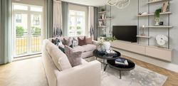 Knights Quarter townhouse living area with a central, cream, L-shaped sofa
