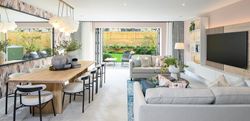 Royal Terrace townhouse open living and dining area with full-width French doors