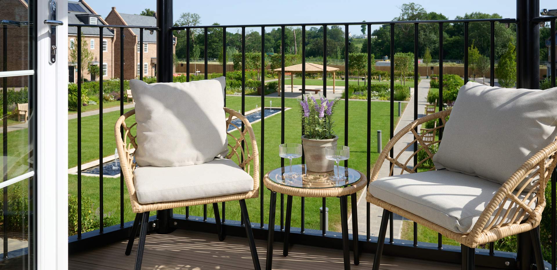 CGI of balcony view overlooking central, private garden.