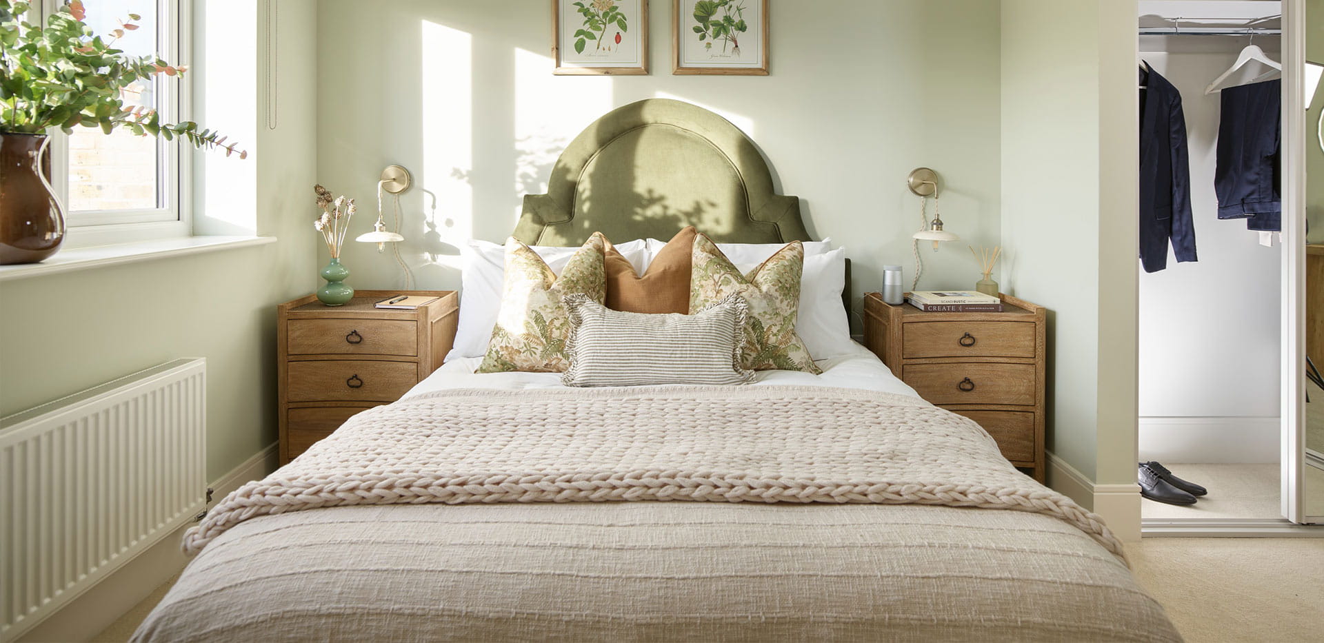 An interior Bedroom with green walls image at the 4 Bedroom Showhome at Leighwood Fields