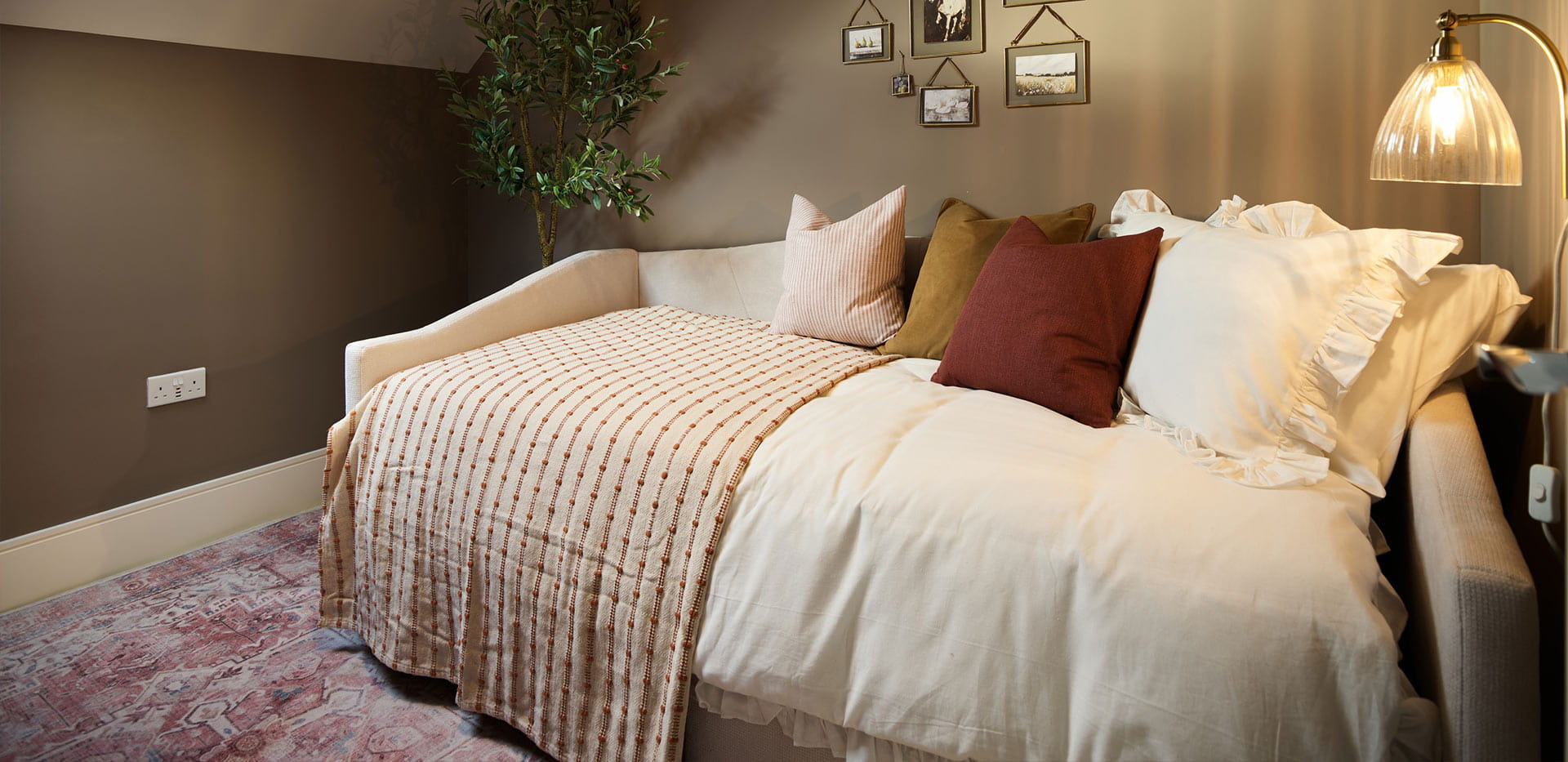 An interior Sofa image at the 4 Bedroom Showhome at Leighwood Fields