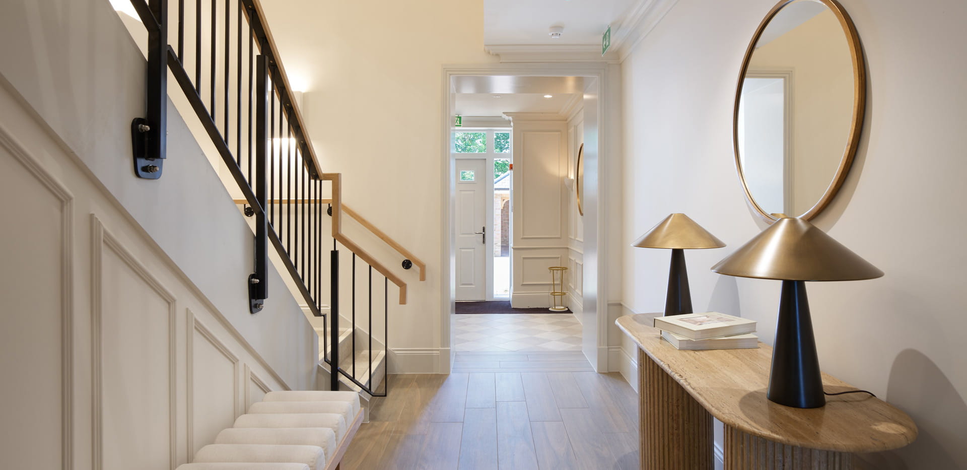 View along hallway looking towards front entrance.