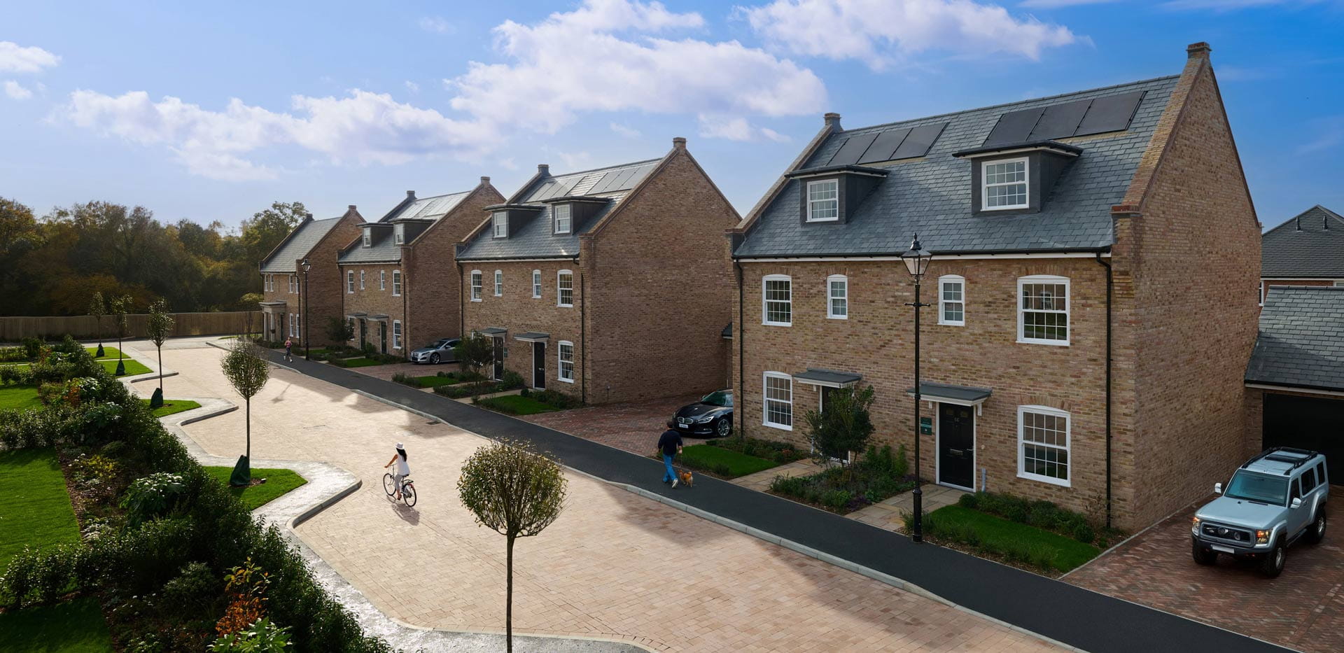 CGI of external development housing facades, private and visitor parking.