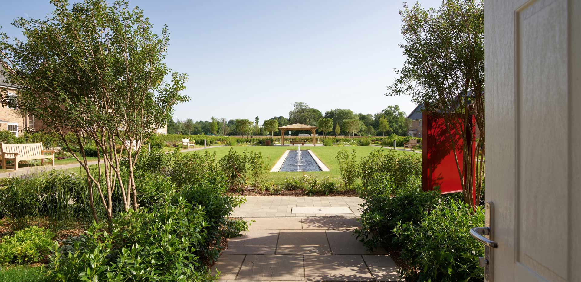 View of central garden and landscaped area from ground level.
