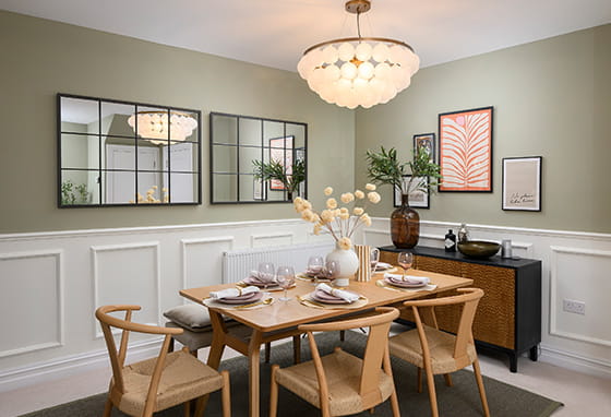 An interior dining room image at a showhome in Leighwood Fields