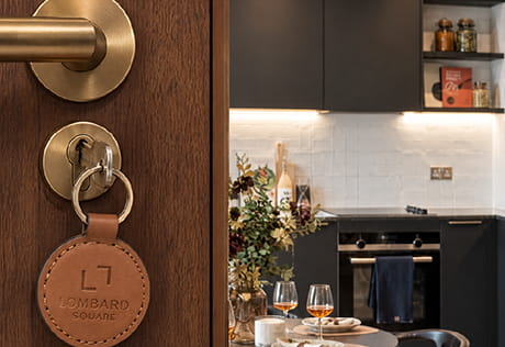Lombard Square apartment entrance with leather keychain