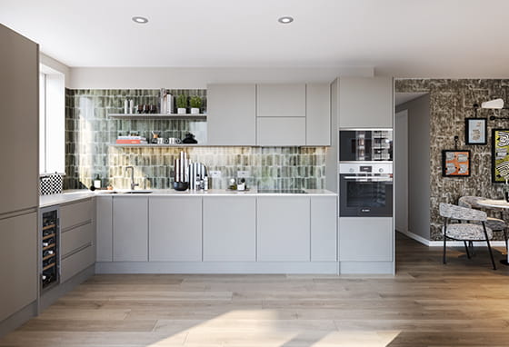 An interior image of an open plan kitchen with a light themed palette