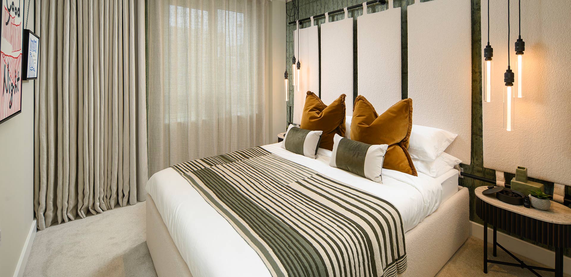 An interior Bedroom image with a green feature wall at Fero House