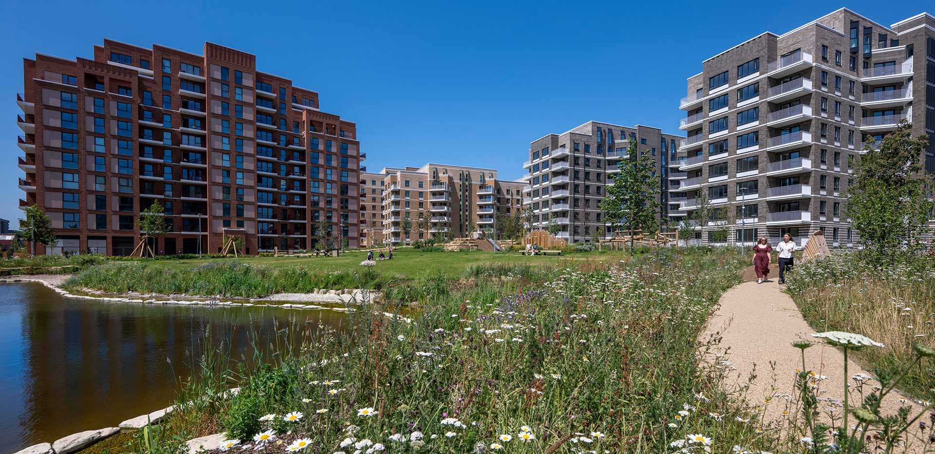 An exterior photograph of the green space and buildings at Lombard Square