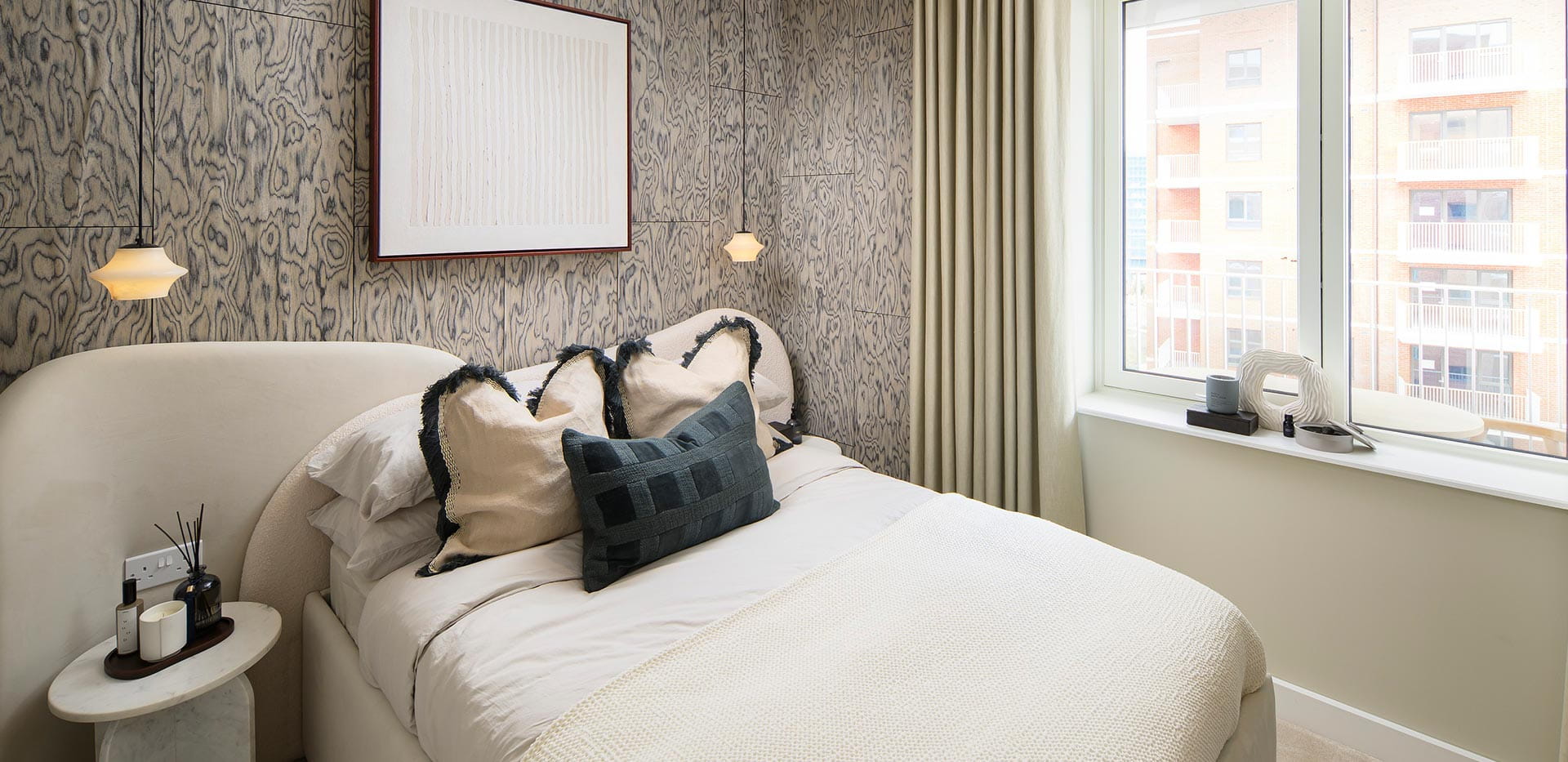 An interior image of a bedroom from a Lombard Square showhome