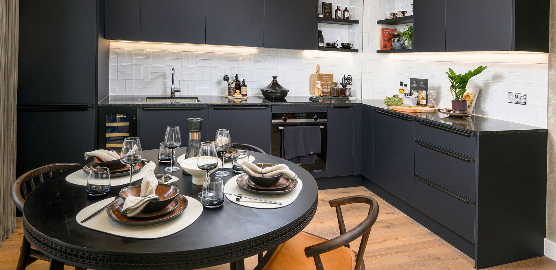 Lombard Square kitchen and dining space with a dark wood design