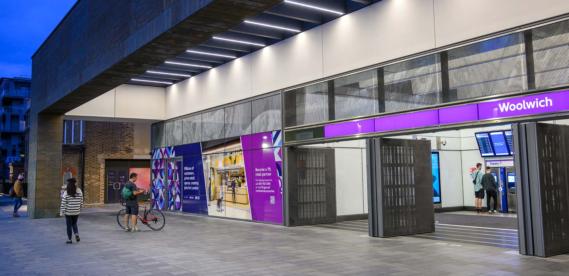 Photography of people exiting Woolwich Train Station