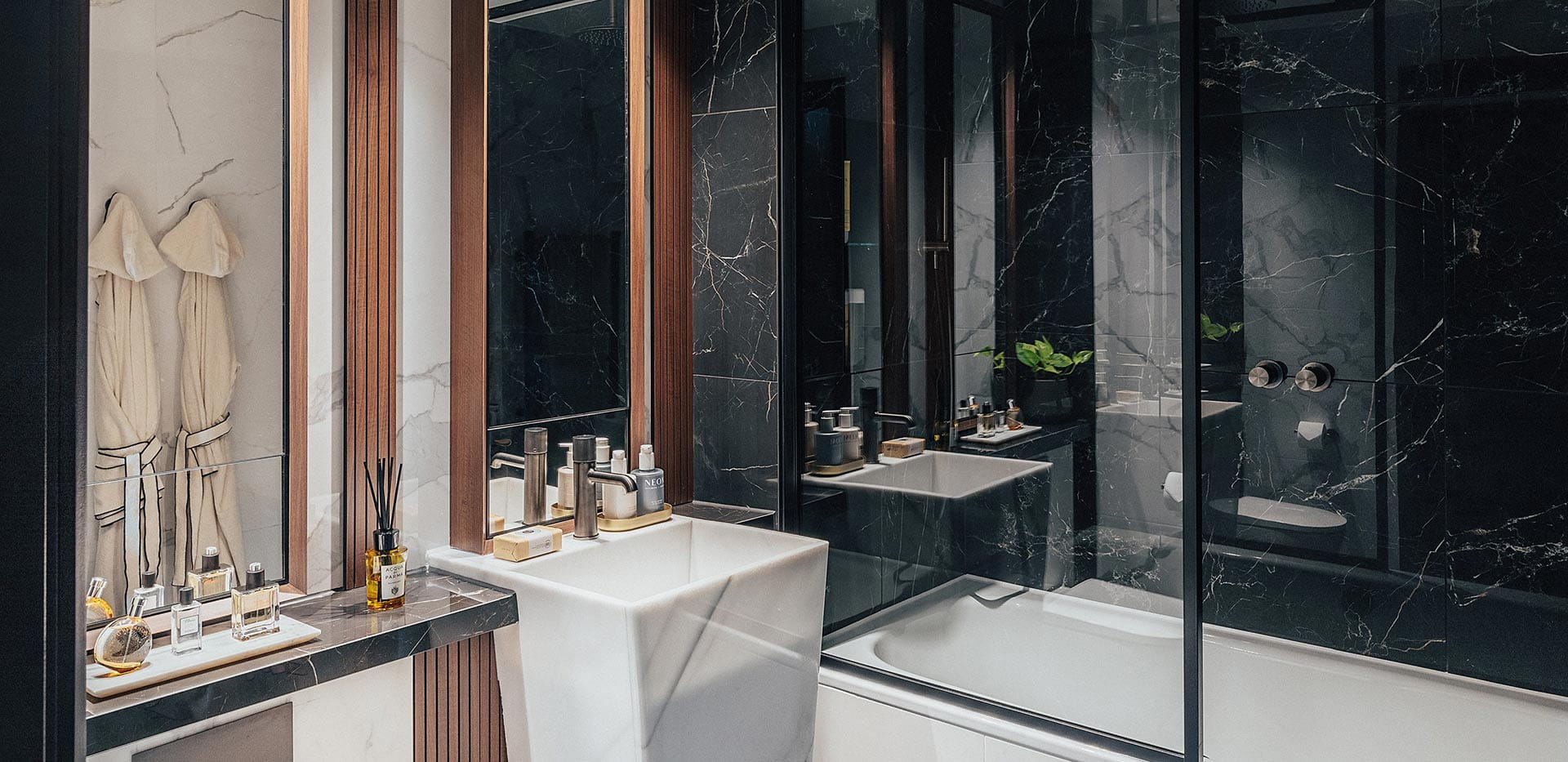 Well decorated bathroom with a dark design