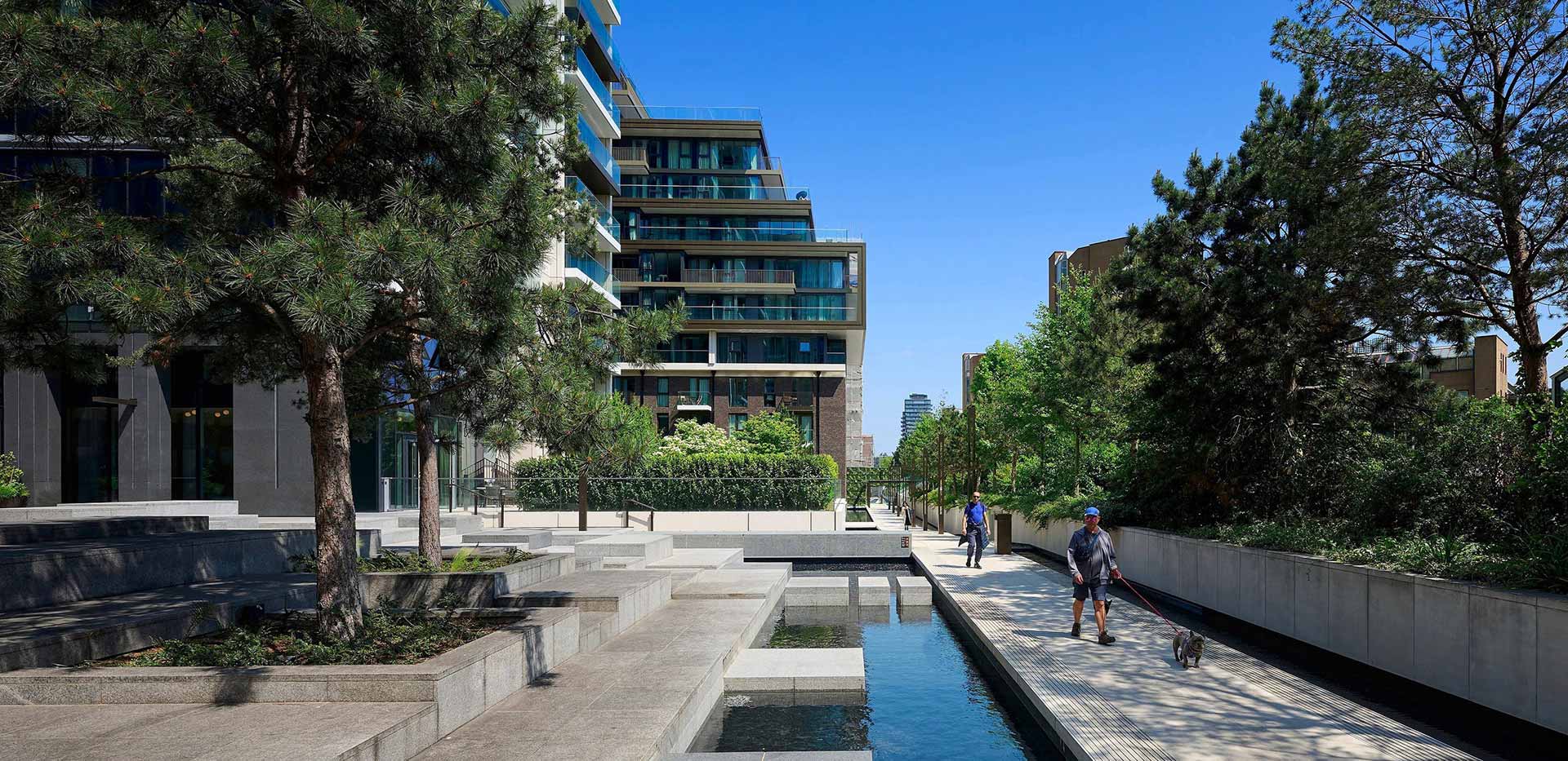 Exterior image at London Dock showing residents walking their dogs