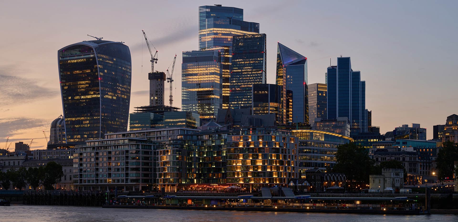 An image of the London skyline at dusk