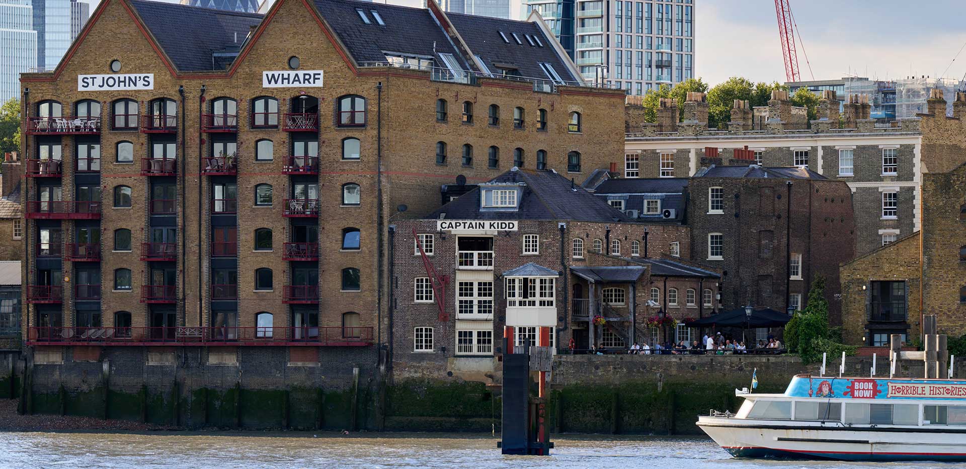 An image of St John's Wharf across the Thames