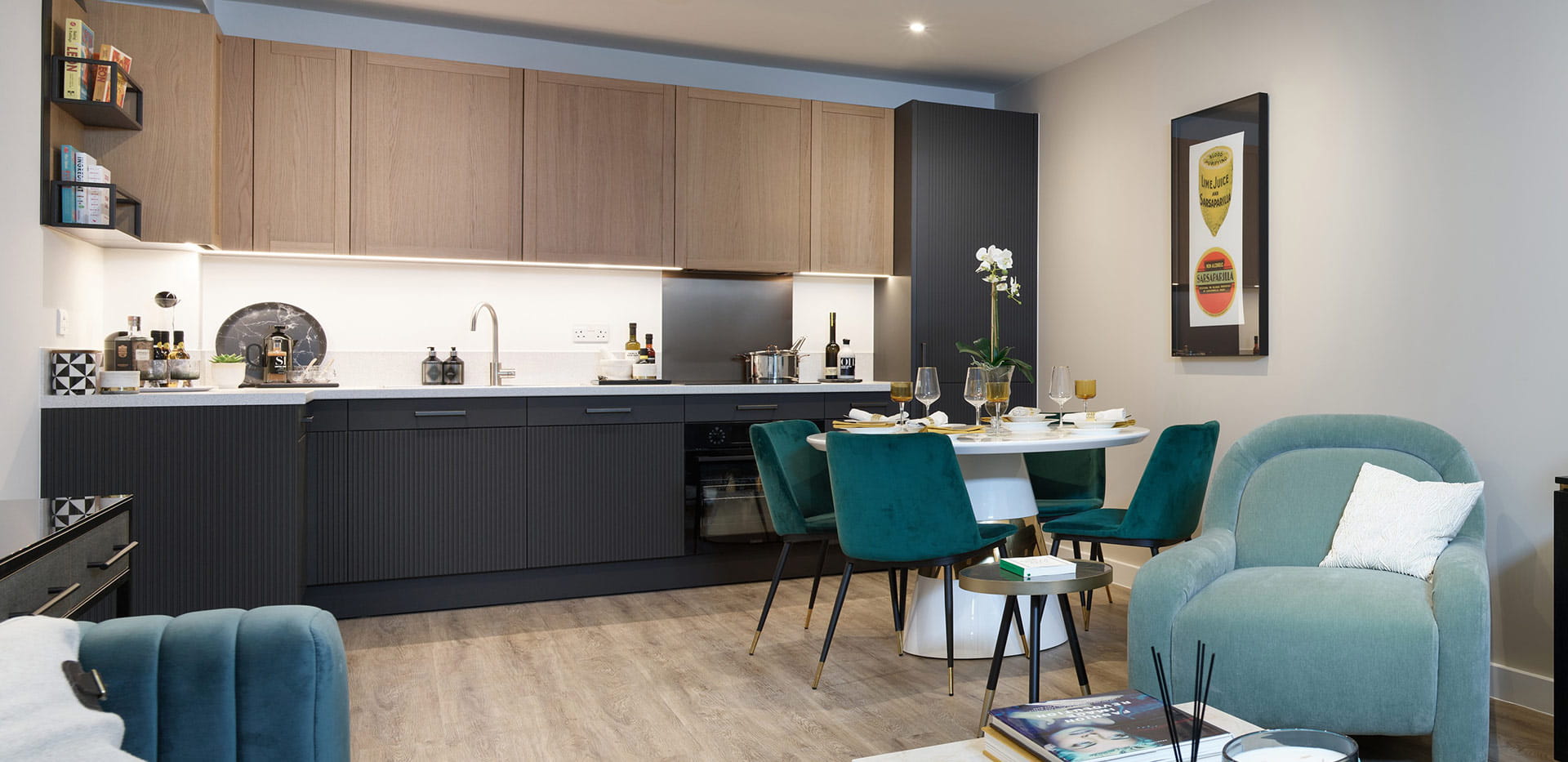 London Dock apartment, wide shot of the kitchen and dining area