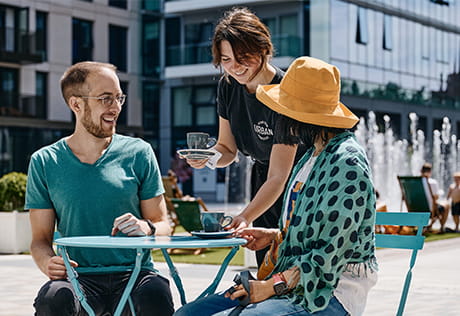 An image of local residents enjoying the cafe service