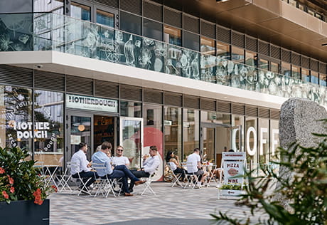 AN image of local residents dining at a cafe