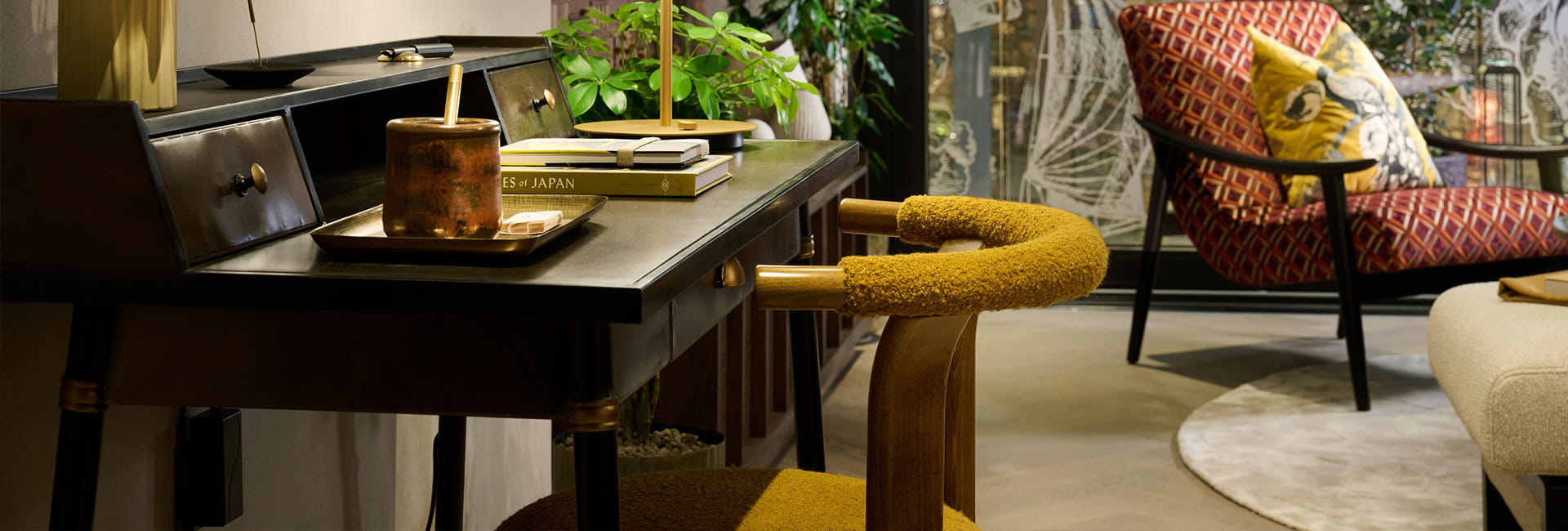 A close up of a desk in the Living Area