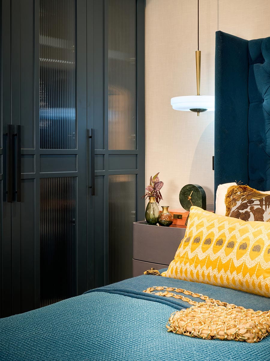 An interior Bedroom image at Saffron Wharf with a Blue Bed